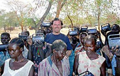 
This undated photo provided by the US Agency for International Development shows John Granville, center, who was shot and killed early Tuesday in Sudan. Associated Press
 (Associated Press / The Spokesman-Review)