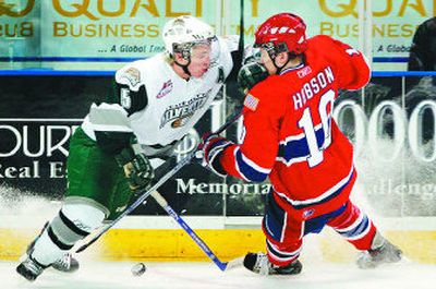 
Everett's Jonathan Harty elbows Adam Hobson. 
 (Jennifer Buchanan Everett Herald / The Spokesman-Review)