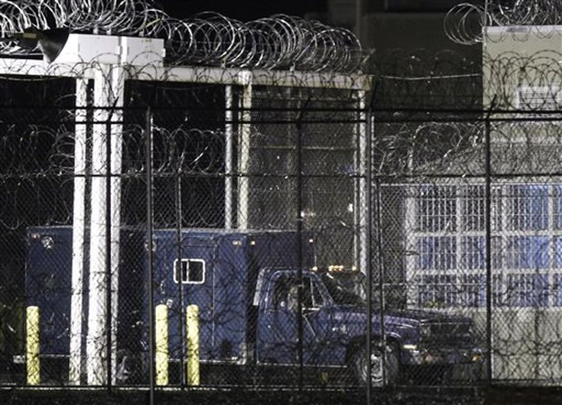 A medical examiners truck leaves the Greensville Correctional Center after the execution of Teresa Lewis in Jarratt, Va., Thursday, Sept. 23, 2010. Teresa Lewis was pronounced dead at 9:13 p.m.  (Steve Helber / (AP Photo/Steve Helber))