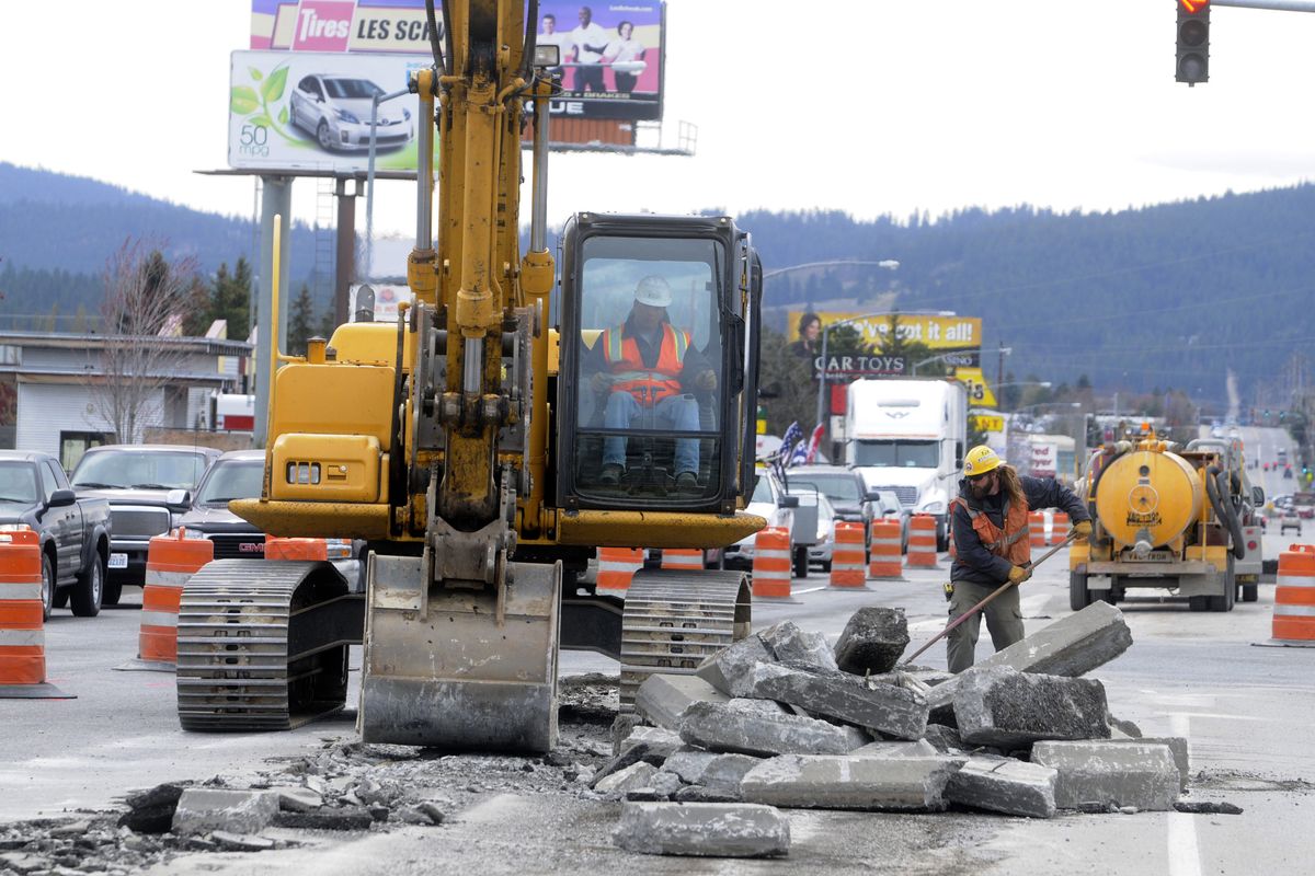 bartr@spokesman.com Northbound traffic on Sullivan at Broadway is backed up during construction  at the intersection, April 12. The project involves replacing the severely rutted asphalt in the intersection with concrete, and should be completed by the end of May. (J. BART RAYNIAK)