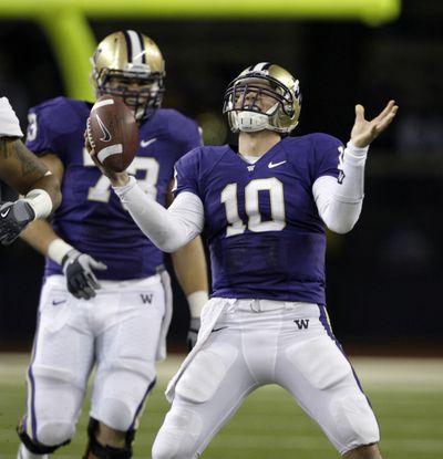 Quarterback Jake Locker’s decision to play his senior season at UW has Huskies fans celebrating today, too.  (Associated Press)