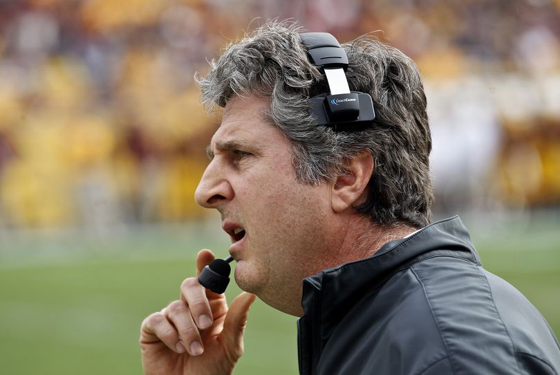 Mike Leach said he has no intentions of leaving WSU and looks forward to results of inquiry. (Associated Press)
