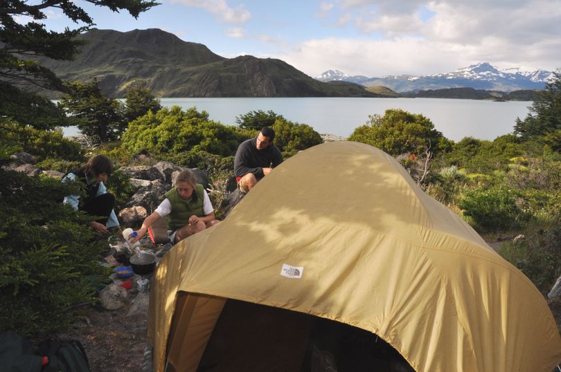 Backpackers prepare breakfast at Los Cuernos Camp on The W route in Chile's Torres del Paine National Park. (Rich Landers)