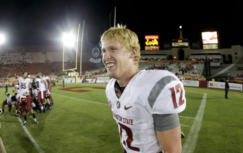 Washington State quarterback Connor Halliday smiles after the team defeated Southern California in an NCAA college football game in Los Angeles, Saturday, Sept. 7, 2013. (Chris Carlson / Associated Press)