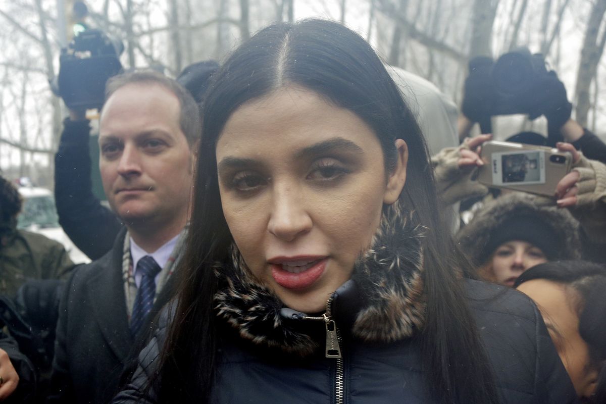 FILE - In this Feb. 12, 2019 file photo, Emma Coronel Aispuro, center, wife of Joaquin "El Chapo" Guzman, leaves federal court in New York. The wife of Mexican drug kingpin and escape artist Joaquin “El Chapo” Guzman has been arrested on international drug trafficking charges at an airport in Virginia. The Justice Department says 31-year-old Emma Coronel Aispuro, who is a dual citizen of the U.S. and Mexico, was arrested at Dulles International Airport on Monday and is expected to appear in federal court in Washington on Tuesday.  (Seth Wenig)