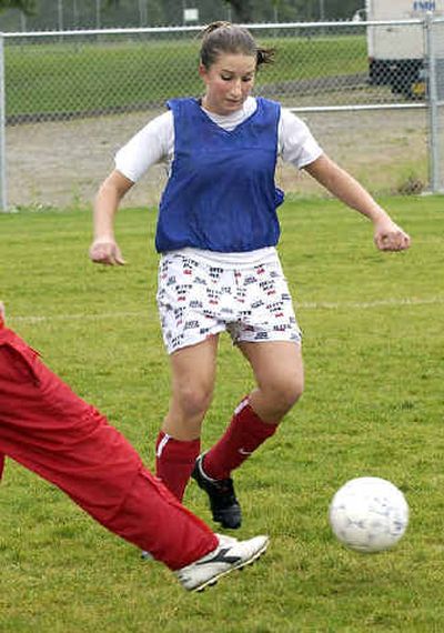 
Riverside High's Britney Paul runs a drill with her teammates in an after-school practice. Paul, a senior, was a first-team all-GNL selection last year.
 (Liz Kishimoto/TheSpokesman-Review / The Spokesman-Review)