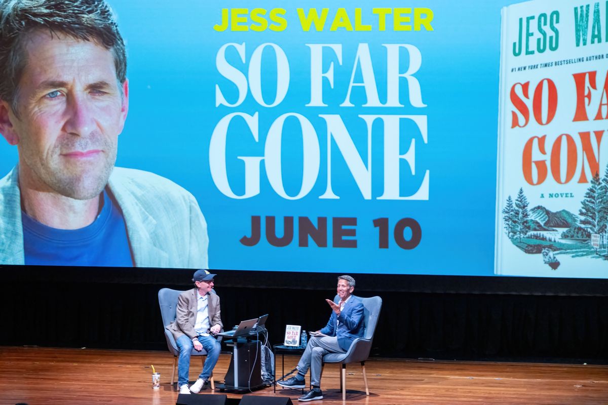In a conversation with Spokesman-Review Editor Rob Curley, left, author Jess Walter talks about his new novel, “So Far Gone,” during a sold-out Northwest Passages book launch event Tuesday at Gonzaga University’s Myrtle Woldson Performing Arts Center. (Colin Mulvany/The Spokesman-Revi)