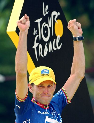 This July 27, 2003 file photo shows Lance Armstrong waving on the podium after he won his fifth consecutive Tour de France cycling race, in Paris. Armstrong was stripped of his seven Tour de France titles and banned for life by cycling's governing body on Monday, following a report from the U.S. Anti-Doping Agency that accused him of leading a massive doping program on his teams. UCI President Pat McQuaid announced that the federation accepted the USADA's report on Armstrong and would not appeal to the Court of Arbitration for Sport.  (Associated Press)