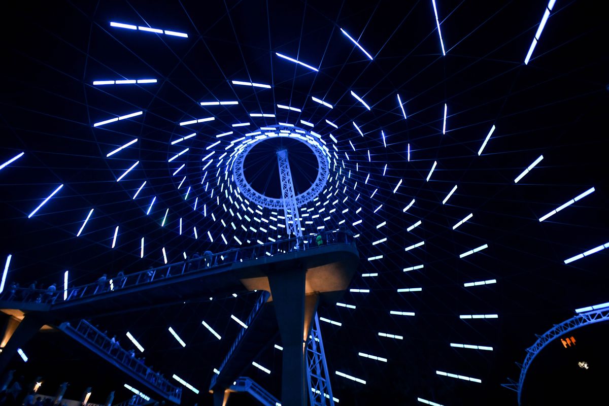 The newly renovated U.S. Pavilion is bathed in light during an opening light show on Friday, Sept. 6, 2019, at Riverfront Park in Spokane, Wash. Tyler Tjomsland/THE SPOKESMAN-REVIEW  (TYLER TJOMSLAND)