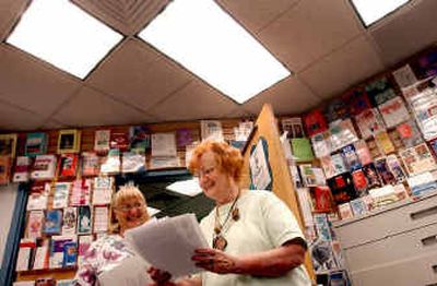 
Marcy Horner, left, and Joan Hust work together in the DeArmond Consumer Health Library at Kootenai Medical Center. Marcy oversees  the consumer and staff libraries. 
 (The Spokesman-Review)