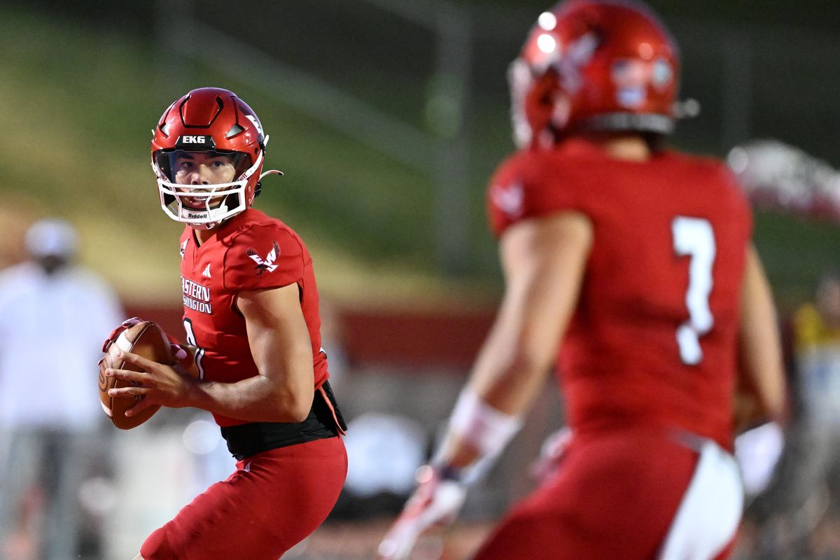 Eastern Washington quarterback Kekoa Visperas looks to pass to wide receiver Efton Chism III during the second half Aug. 29 at Roos Field in Cheney.  (Tyler Tjomsland/The Spokesman-Review)