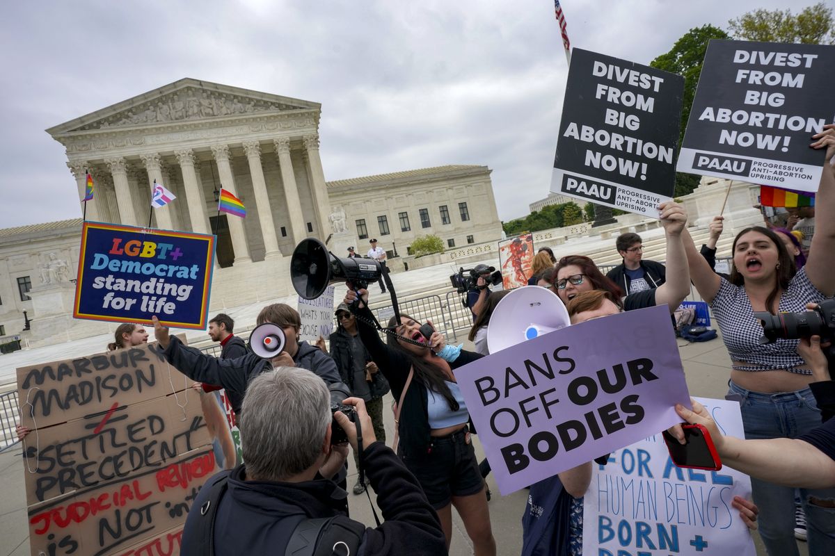 Antiabortion protesters use bullhorns to counter a gathering of mostly abortion rights advocates in front of the U.S. Supreme Court on May 3, 2022. MUST CREDIT: Bonnie Jo Mount/The Washington Post  (Bonnie Jo Mount/The Washington Post)