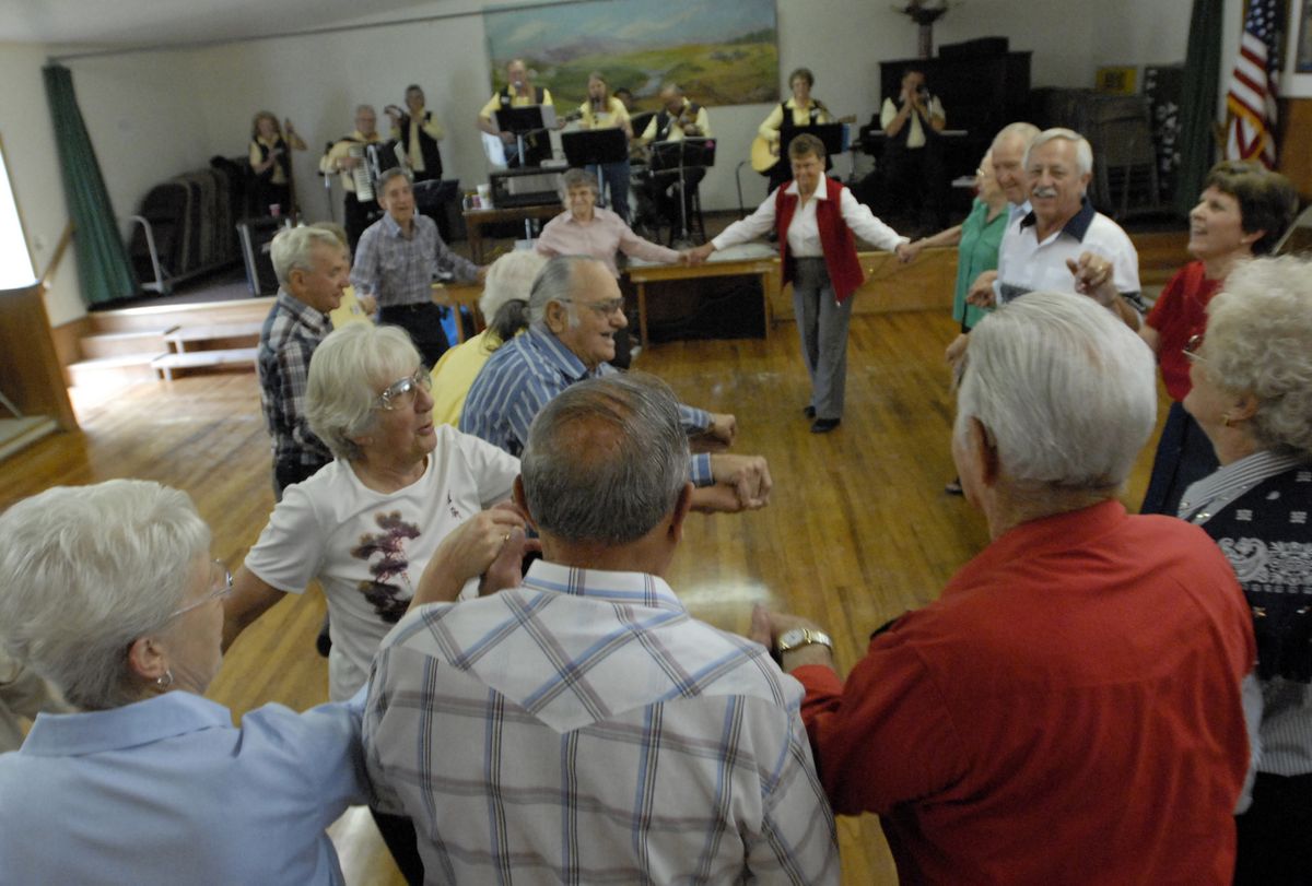When the “Country Jammers” play “The Wabash Cannonball,” folks hit the dance floor at the Newman Lake Grange, grab hands and circle up for a round dance. “This is a special dance we do at the Grange,” said Newman Lake resident Lucy Mott. (J. Rayniak / The Spokesman-Review)