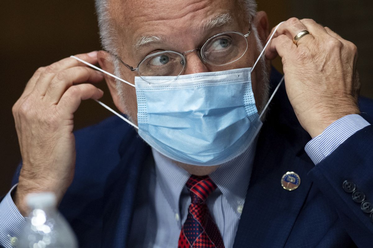 Dr. Robert Redfield, Director of the Centers for Disease Control and Prevention (CDC), testifies during a Senate Appropriations subcommittee hearing on the plan to research, manufacture and distribute a coronavirus vaccine, known as Operation Warp Speed, Thursday, July 2, 2020, on Capitol Hill in Washington. (Saul Loeb)