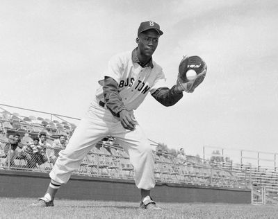In this April 1959 photo, Boston Red Sox’s Elijah “Pumpsie” Green poses for a photo, location not known. Green, the first black player on the Red Sox, has died. He was 85. A Red Sox spokesman confirmed his death Wednesday night, July 17, 2019. (Harold Filan / Associated Press)