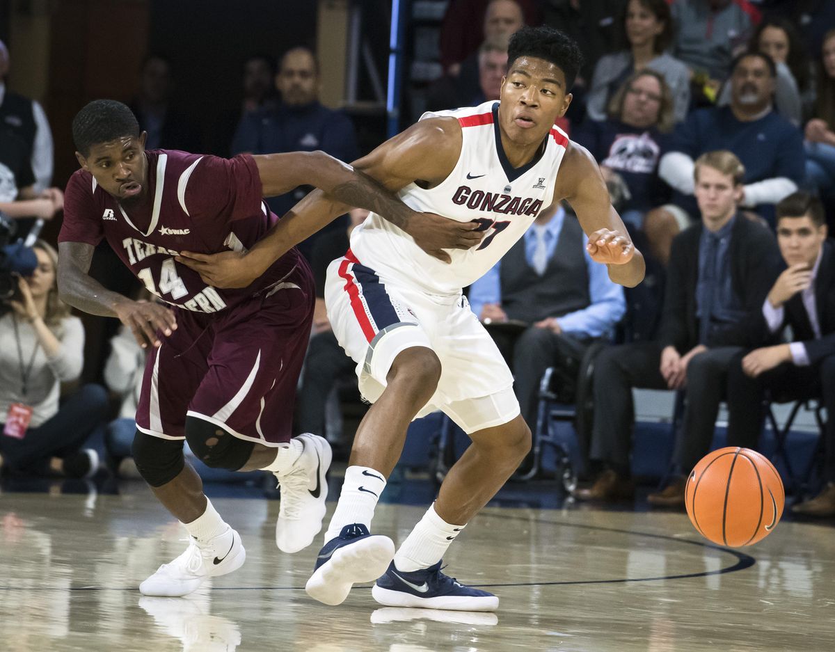 Texas Southern forward Lamont Walker  and Gonzaga forward Rui Hachimura  chase a loose ball during the second half of last year’s game  at the McCarthey Athletic Center. (Colin Mulvany / The Spokesman-Review)