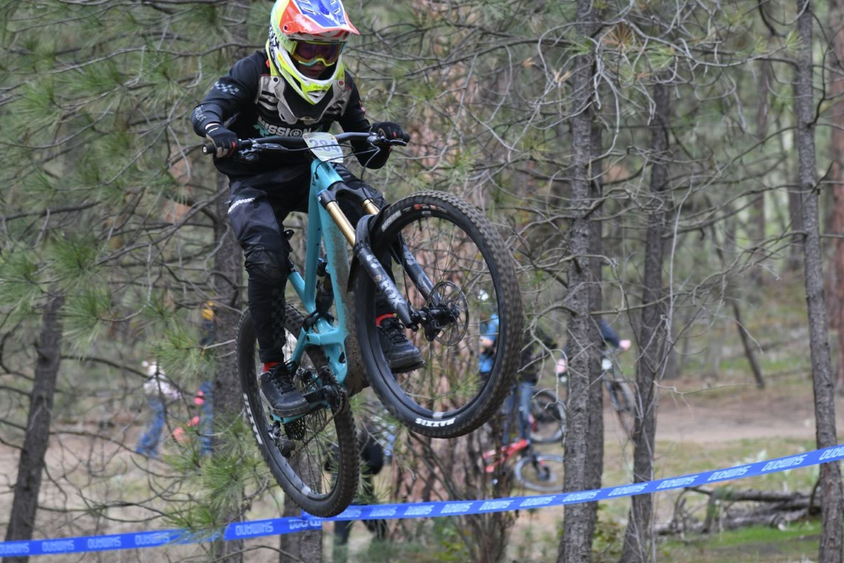 Liam Shultz, 12, soars after hitting a big jump during the Hubapalooza downhill bike race at Camp Sekani on the Beacon Hill bike park.  (JOHN STUCKE/THE SPOKESMAN-REVIEW)