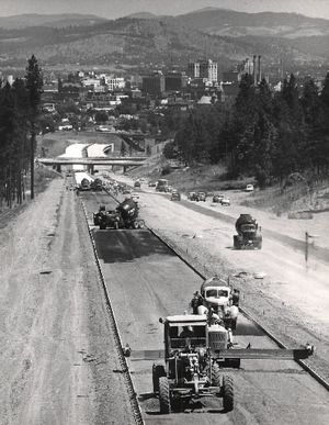 Downtown Spokane is seen in the background of this July 1964 photo of construction on the four mile section of Interstate 90 that linked the Latah Creek Bridge and the Cheney Highway near Geiger Field.   (FILE PHOTO THE SPOKESMAN REVIEW-CHRONICLE )
