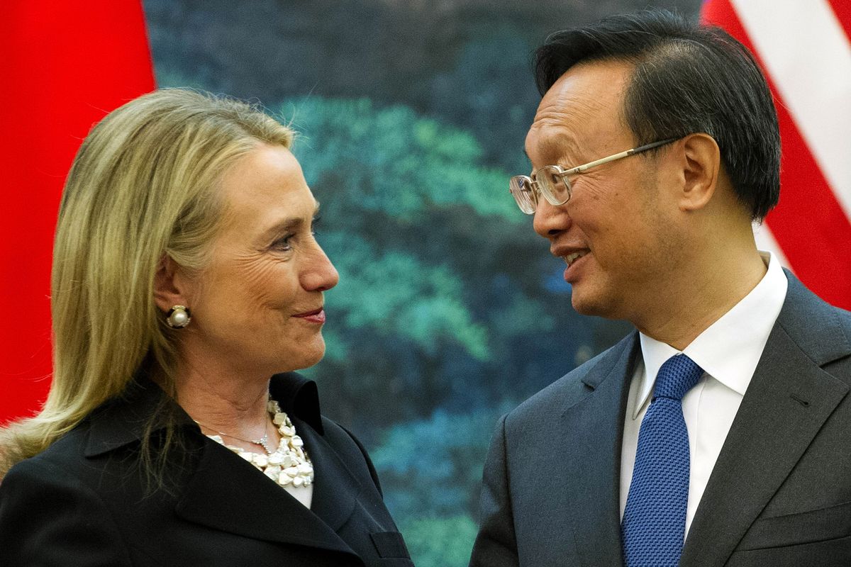 U.S. Secretary of State Hillary Rodham Clinton, left, speaks with Chinese Foreign Minister Yang Jiechi during a joint press conference at the Great Hall of the People in Beijing, China Wednesday, Sept. 5, 2012. (Jim Watson / Pool Afp)
