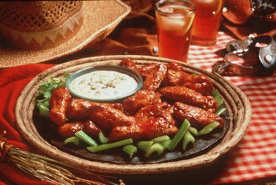
Get your party started with these delicious Buffalo-Style Chicken Wings. 
 (File Photo / The Spokesman-Review)