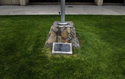 A flagpole on the east side of the Public Safety Building is dedicated to World War II veteran John David Phillips, and is dated Dec. 7, 1973.
(Jed Conklin / The Spokesman-Review)