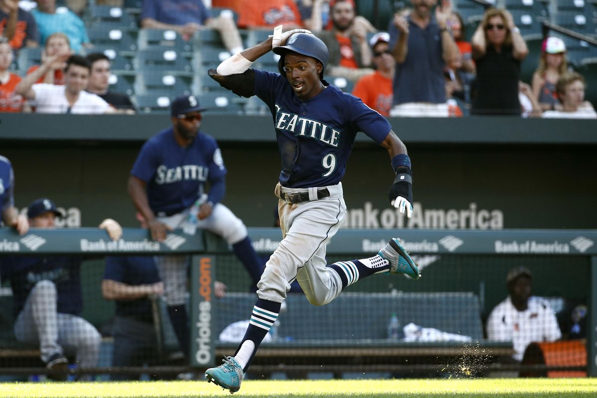 Seattle Mariners’ Dee Gordon scores a run on a single by Jean Segura in the 10th inning of a baseball game against the Baltimore Orioles, Thursday, June 28, 2018, in Baltimore. Seattle won 4-2 in 10 innings. (Patrick Semansky / Associated Press)