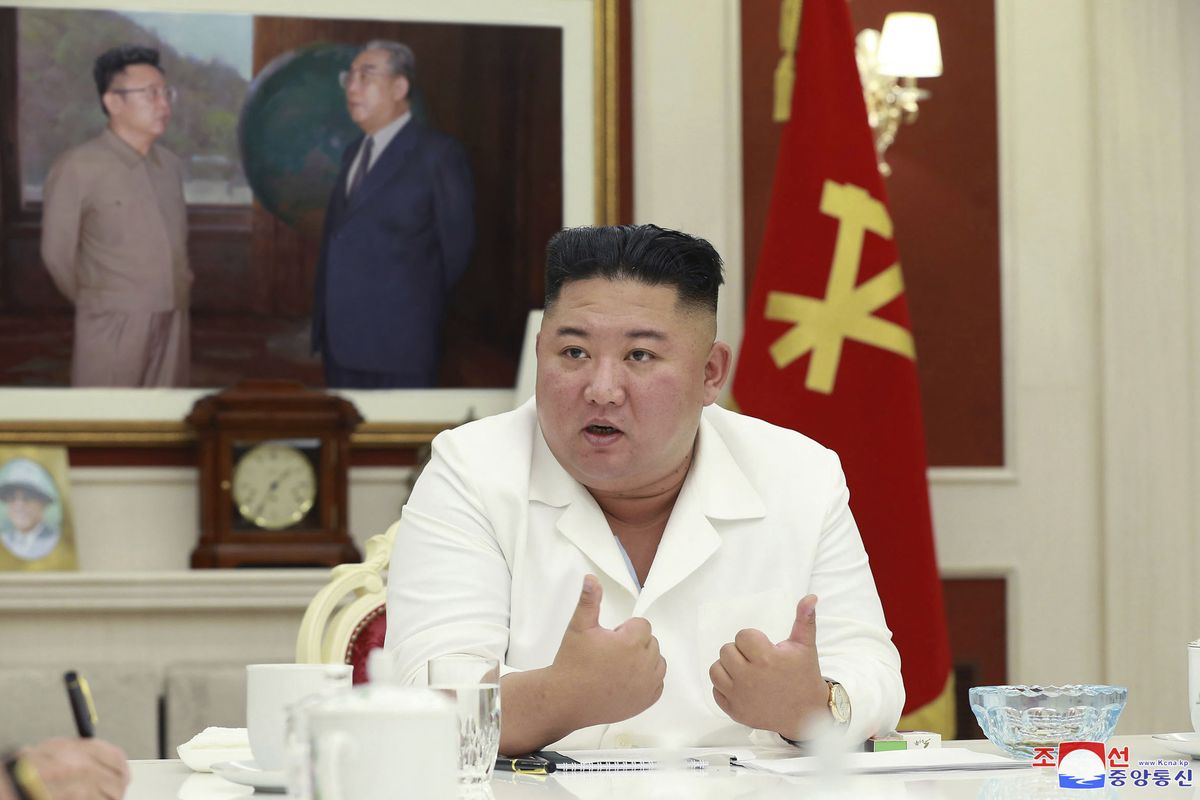 In this photo provided by the North Korean government, North Korean leader Kim Jong Un, presides over an executive policy council meeting at the ruling Workers’ Party in Pyongyang, North Korea, Wednesday, Aug. 5, 2020. Kim Jong Un directed his government agencies to act immediately to stabilize the livelihoods of residents in a city locked down over coronavirus concerns, state media reported Thursday, Aug. 6, 2020. Independent journalists were not given access to cover the event depicted in this image distributed by the North Korean government. The content of this image is as provided and cannot be independently verified. Korean language watermark on image as provided by source reads: "KCNA" which is the abbreviation for Korean Central News Agency. (HOGP)