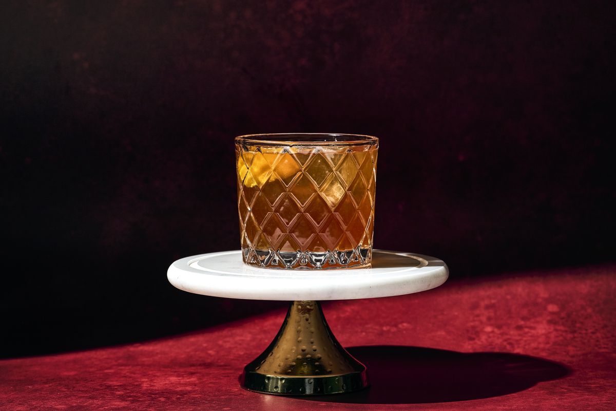 The Nonalcoholic Maple Old-Fashioned uses aged maple syrup to add smoky notes.  (Marvin Joseph/The Washington Post / Food styling by Lisa Cherkasky/The Washington Post)
