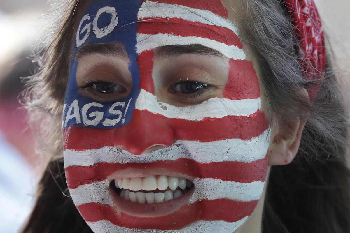 A Gonzaga student smiles as she enters University of Phoenix stadium before the championship game between North Carolina and Gonzaga at the Final Four NCAA college basketball tournament, Monday, April 3, 2017, in Glendale, Ariz. (Matt York / AP)