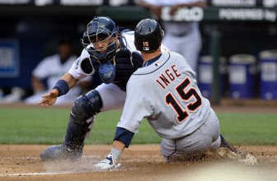 
Seattle catcher Kenji Johjima tags Detroit's Brandon Inge. Associated Press
 (Associated Press / The Spokesman-Review)