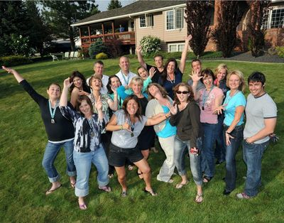 Irene Gonzales, center, a longtime teacher, principal and administrator, poses with friends at a post-race party on May 27, 2012, her 50th birthday.