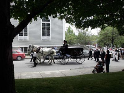 
The casket of Nathaniel Hawthorne's wife and daughter is taken to their family grave site Monday. 
 (Associated Press / The Spokesman-Review)