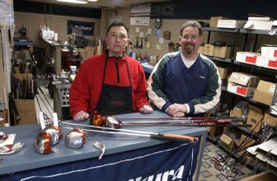 
Mike Mengert and Don Sullivan custom fit, build and repair golf clubs at King of Clubs  in Millwood. 
 (J. BART RAYNIAK / The Spokesman-Review)