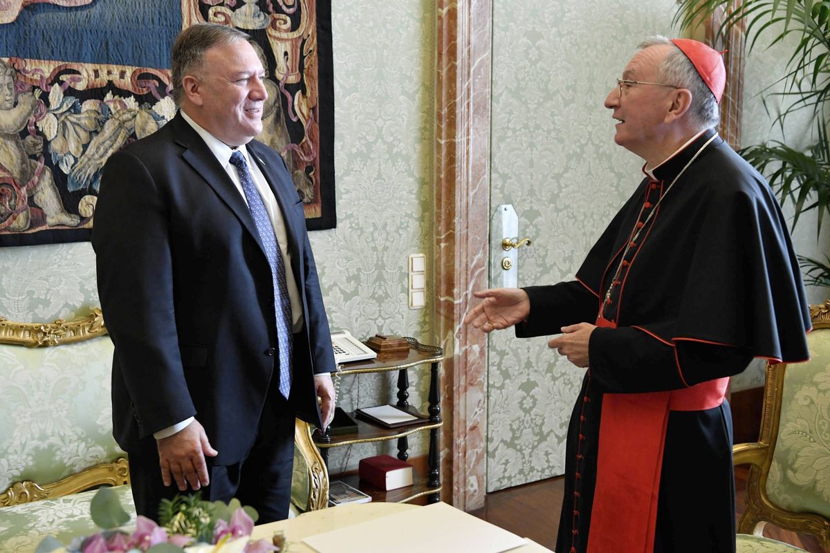 U.S. Secretary of State Mike Pompeo meets Vatican Secretary of State Cardinal Pietro Parolin, at the Vatican, Thursday, Oct. 1, 2020. Pompeo is meeting Thursday with top Vatican officials, a day after tensions over U.S. opposition to the Vatican’s China policy spilled out in public.  (HONS)
