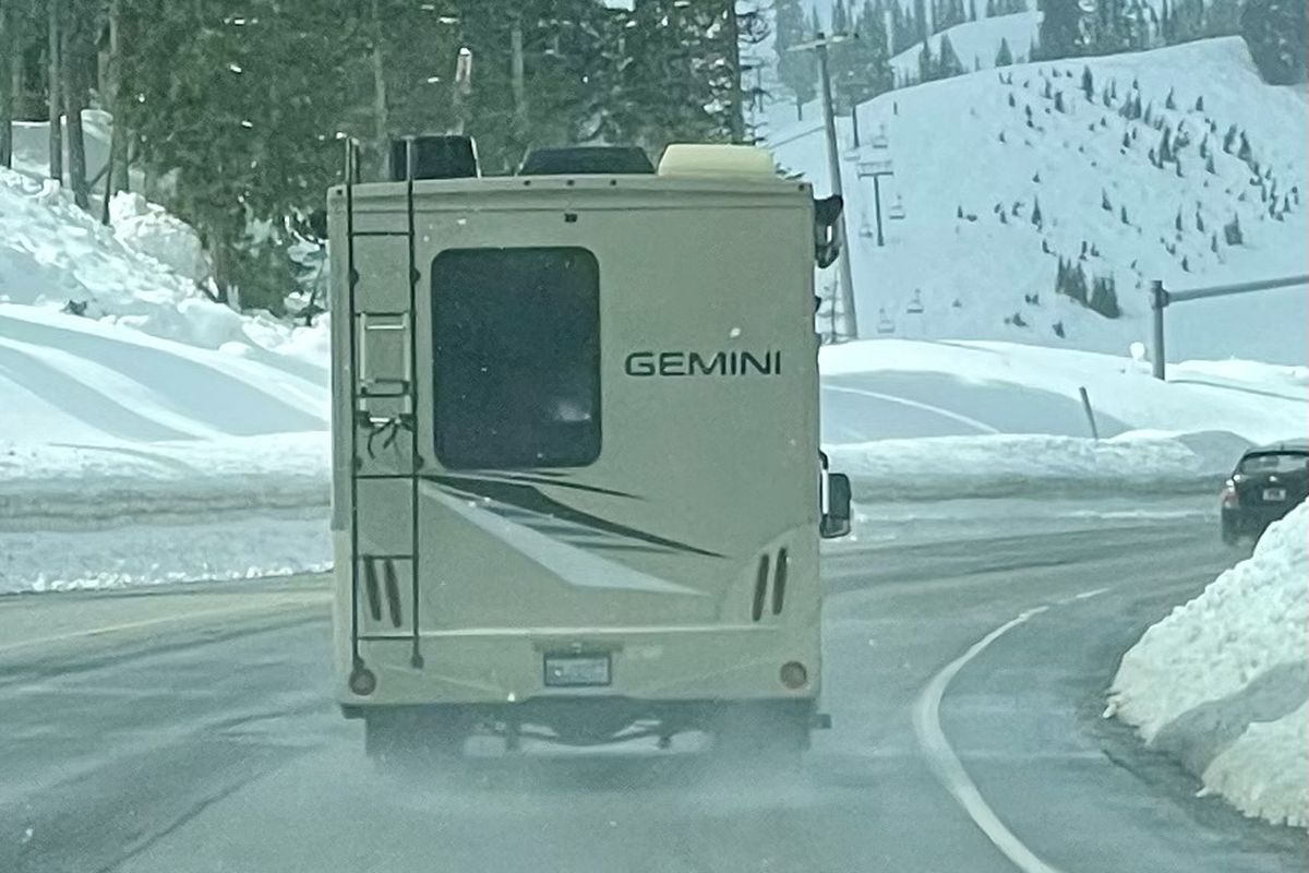 Smoke spews from a Thor Gemini during a road trip over Stevens Pass in April. (Leslie Kelly)