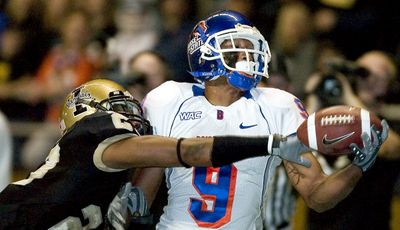 Kenneth Patten of the Vandals deflects a pass intended for Boise State’s Jeremy Childs during the first quarter of Saturday’s game.   (Associated Press / The Spokesman-Review)