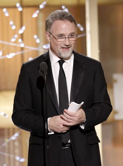 David Fincher accepts  the Golden Globe Award for best director.  (Associated Press)