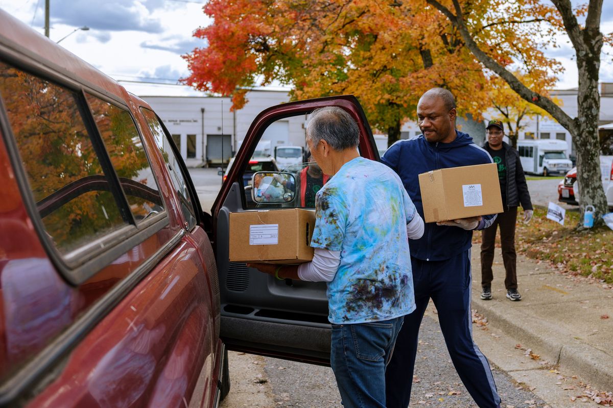 Capital Area Food Bank volunteers provide food to federal workers during the government shutdown on Oct. 25 in Beltsville, Md., Oct. 25, 2025. Tariffs and uncertainty were already making the economy hard to read. The loss of government data during the shutdown has made the situation much worse.(Lawren Simmons/The New York Times)  (LAWREN SIMMONS)