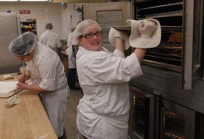 Emily Underhill tends to a sheet of cookies in the kitchen at the Spokane Skills Center. Her experience with the culinary program there has motivated her to study culinary arts at Spokane Community College. bartr@spokesman.com (J. BART RAYNIAK bartr@spokesman.com / The Spokesman-Review)