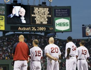 ORG XMIT: MAEA113 Boston Red Sox players watch the scoreboard screen as Sen. Edward Kennedy is honored prior to a baseball game between the Red Sox and the Chicago White Sox at Fenway Park in Boston on Wednesday, Aug. 26, 2009. Kennedy, 77, died late Tuesday. (AP Photo/Elise Amendola) (Elise Amendola / The Spokesman-Review)