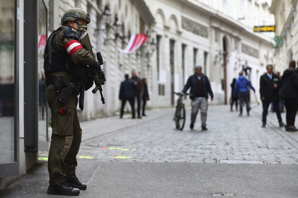 A military police officer guard at the crime scene near a synagogue in Vienna, Austria, Wednesday, Nov. 4, 2020. Several shots were fired shortly after 8 p.m. local time on Monday, Nov. 2, in a lively street in the city center of Vienna.  (Matthias Schrader)
