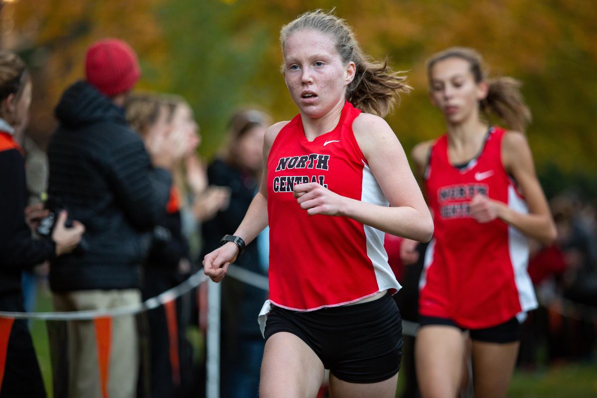 Erinn Hill of North Central wins the girls