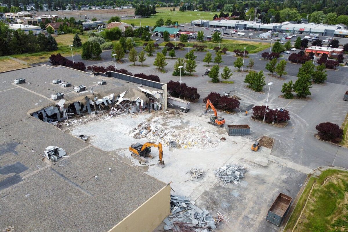 The former Shopko store on South Regal Street on Spokane’s South Hill is being torn down, shown Wednesday, to prepare the site for a new Home Depot store. The large home improvement store will be in direct competition with the large Ace Hardware, seen at upper right, across Regal from this location.  (Jesse Tinsley / The Spokesman-Review)