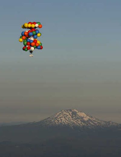 
Balloonist Kent Couch ascends past Mount Bachelor in 2007. Associated Press
 (File Associated Press / The Spokesman-Review)