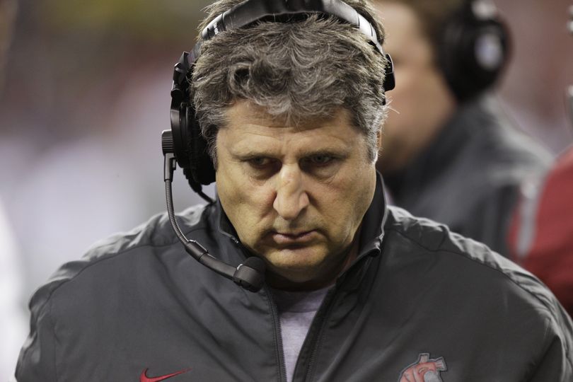 Washington State coach Mike Leach walks on the sideline during the first half of an NCAA college football game against Oregon, Saturday, Sept. 29, 2012, in Seattle. (Ted Warren / Associated Press)