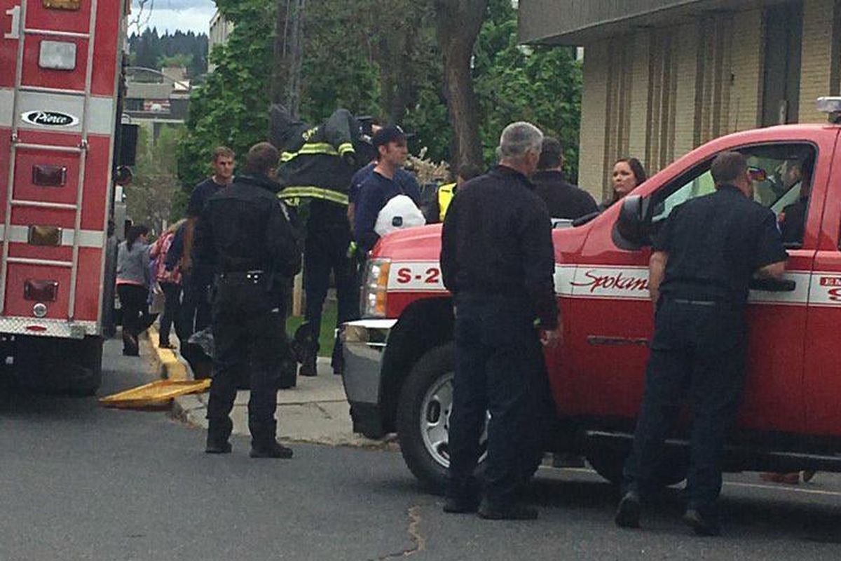 Spokane fire crews respond to the courthouse on a report of an envelope with a white powdery substance on Friday, May 12, 2017. (Nina Culver / The Spokesman-Review)