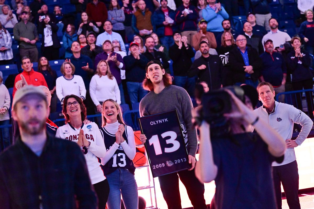 Former Gonzaga standout Kelly Olynyk, who now plays for the Utah Jazz, reacts during a ceremony to retire his jersey before the start of the first half of a college basketball game on Monday, Dec. 5, 2022, at McCarthey Athletic Center in Spokane, Wash.  (Tyler Tjomsland/The Spokesman-Review)