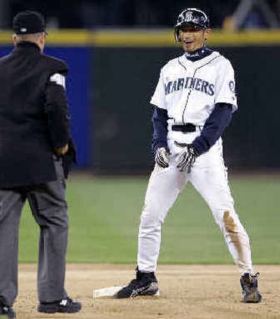 
Ichiro Suzuki is out on this steal attempt  Monday, but manager Mike Hargrove will keep pressuring opponents on the basepaths.
 (Associated Press / The Spokesman-Review)