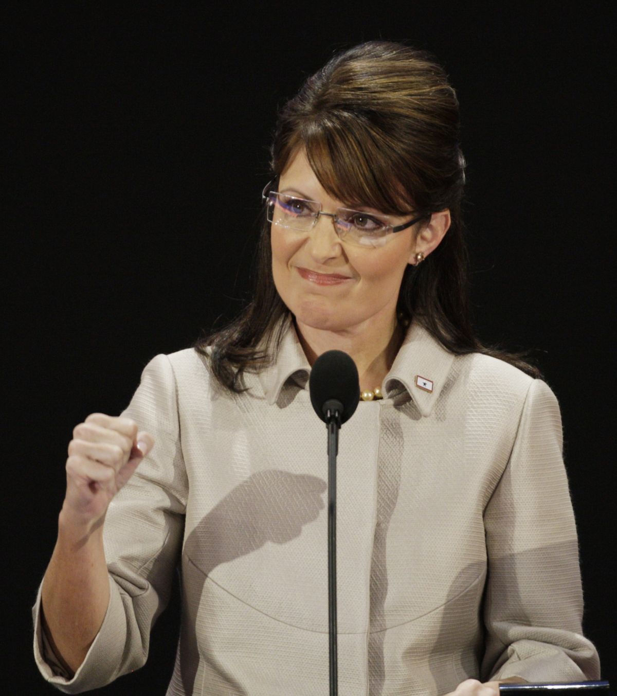 Republican vice presidential candidate Sarah Palin pumps her fist during her speech Wednesday at the Republican National Convention in St. Paul, Minn. Associated Press photos (Associated Press photos / The Spokesman-Review)