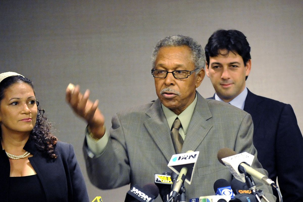 Plaintiffs Colleen Lawson and  Otis McDonald, center,  and attorney Alan Gura at a news conference Wednesday. (The Spokesman-Review)